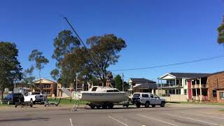 Trailer sailer mast lowering on a Farr 7500 trailer yacht [upl. by Nosnarb]