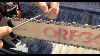 How to file a chainsaw chain Throw away your file guides [upl. by Enymzaj]