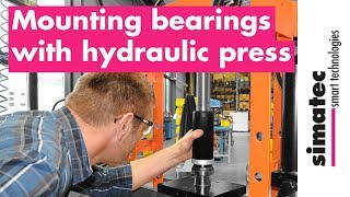 Mounting bearings with hydraulic press [upl. by Duval]