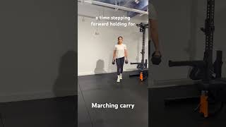 Marching weighted carry core carries farmerscarry weightedcarry coreworkout [upl. by Acissj]