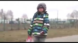 WATCH Young Sobbing Ukrainian Boy walks into Poland [upl. by Levan]