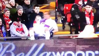 Liverpool fan sees Gabby Agbonlahor fall over avdertising hoardings whips out his camera [upl. by Fortier884]