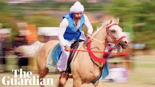 Tent pegging in the UK In neza bazi anything can happen [upl. by Refinnaej565]