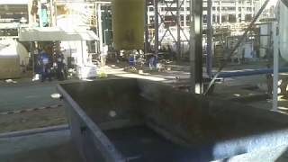 DrM FUNDABAC® Dry Cake Discharge Into Tank Filled with Rainwater [upl. by Havens]