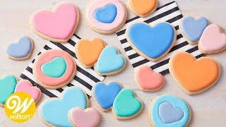 How to Make Thinned Royal Icing For Cookie Decorating  Wilton [upl. by Tewfik308]