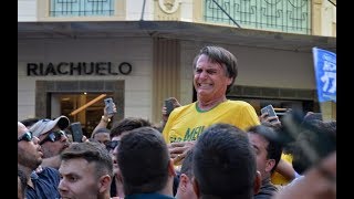 Brazilian presidential candidate Jair Bolsonaro STABBED at rally [upl. by Mallis]