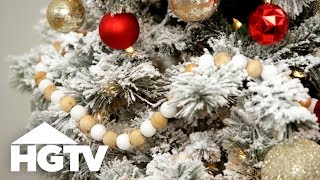 How to Flock a Christmas Tree  HGTV [upl. by Ahsaenat]