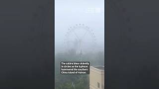 Ferris wheel cabins spin violently as Typhoon Yagi hits southern China’s Hainan Island [upl. by Ahsinod]