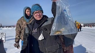 Nearly 10000 anglers attend worlds largest charitable ice fishing contest [upl. by Kendy]