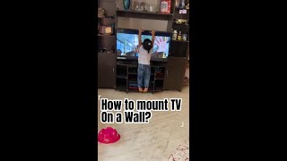 How to Mount Your TV on the Wall Safely [upl. by Rehpotisrhc]