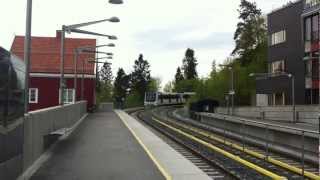 Oslo Tbane line 1 train from Frognerseteren to Helsfyr arriving at Holmenkollen station [upl. by Lahcim]