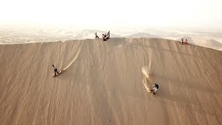 Sandboarding the Peruvian Sand Dunes of Huacachina [upl. by Aillimac903]