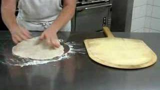 rolling out pizza dough [upl. by Dnomyaw]