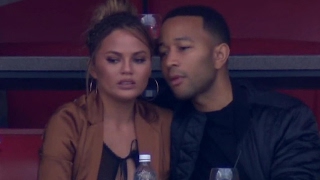 Chrissy Teigen Suffers Wardrobe Malfunction At Super Bowl 51 amp Gives PRICELESS Reaction [upl. by Magdalena12]