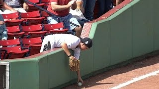 Young fan avoids interfering with fair ball [upl. by Najram215]