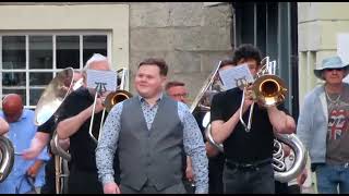 Kirkby Lonsdale Bands in competition march down street [upl. by Aihsenet]