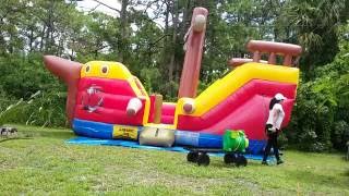 Julie roll up the pirate ship bounce house using the deflator [upl. by England223]