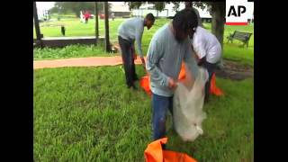 Residents help sandbag a seafood shed in the town of Jean Lafitte La on Friday Tropical Storm Le [upl. by Asilehc]