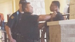 Texas cop grabs 14yearolds throat slams him [upl. by Ermina]