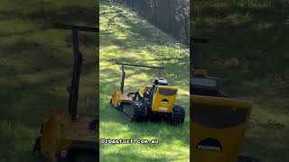 McConnel Robocut neatly trimming grass around a steep lake in Fern Tree Gully Victoria [upl. by Savior]