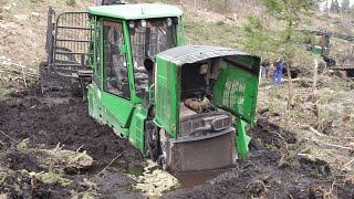 John Deere 1110E stuck deep in mud saving with homemade forwarder [upl. by Esnohpla827]