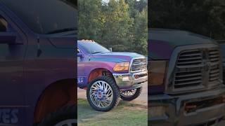 Custom Dodge Ram Dually Truck Lifted and Wrapped pulling some Kandy Toys inside the Show [upl. by Bess325]