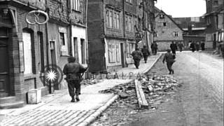 99th Infantry Division enters the city and civilians carrying their belongings waHD Stock Footage [upl. by Brag572]