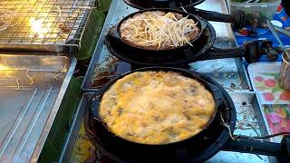 Street food Crisp fried mussel pancakesChiva Market Phuket [upl. by Atiuqram]