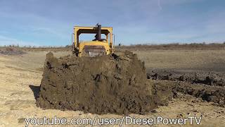 CAT D7E PUSHING WET TOPSOIL [upl. by Anairol]