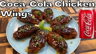 How to make Delicious Sticky CocaCola Chicken Wings [upl. by Swanhildas]