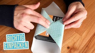 Weihnachtsgeschenk richtig einpacken  Geschenk mit wenig Papier einpacken [upl. by Sgninnej618]