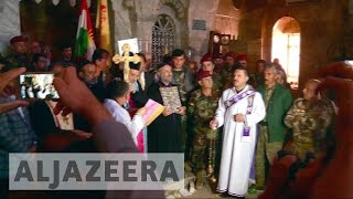 Iraqi Christians rebuild churches after ISIL [upl. by Ennayelhsa702]