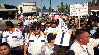 Disneyland workers threaten resort shut down with strike action  AFP [upl. by Noella5]