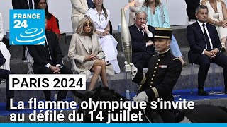 Paris 2024  la flamme olympique sinvite aux festivités du 14 juillet dans la capitale [upl. by Pammy399]