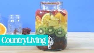 How to Make Rainbow Sangria  Country Living [upl. by Yruam74]