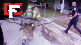 Firefighters Rescue Victim from Burning Home [upl. by Mani]