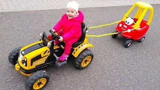 Little Girl Elis Ride On Tractor with Cozy Coupe Little Tikes with Baby Dolls Outdoor Activity [upl. by Tada]