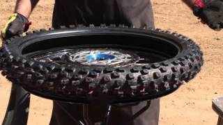 Dunlop Motorcycle How To Change A Motocross Tire [upl. by Aksoyn728]