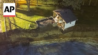 WATCH Video captures house collapsing into water next to Minnesota dam [upl. by Borchers728]