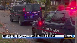 Police Man shot outside a home in southeast Grand Rapids [upl. by Griffis439]