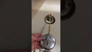 Installing trip lever plate and linkage assembly in bathtub [upl. by Sunshine]