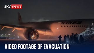 New footage of passengers evacuating burning plane in Japan [upl. by Annodas200]