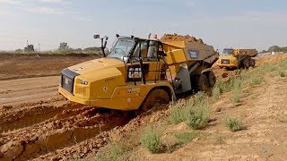 Caterpillar 390D Excavator Loading Caterpillar 775E Dumper And Trucks  Pyramis Ate [upl. by Munson]