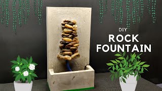 How to Make a DIY Fountain using RIVER ROCKS and CEMENT  IndoorOutdoor Fountain DIY [upl. by Mapel]