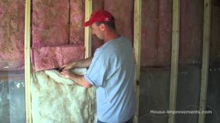 How To Install Fiberglass Batt Insulation amp Vapor Barrier [upl. by Acenahs]