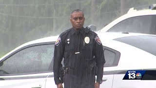 Alabama police officer stands in rain to pay respect for WWII veteran [upl. by Liggitt]