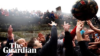 Thousands gather for annual Royal Shrovetide Football game [upl. by Worrell864]