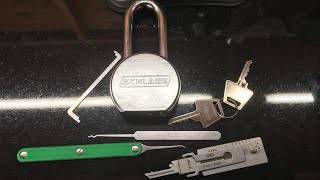 SCHLAGE round bodied padlock with AM5 core Picked Raked amp Lishi’d 6 pins [upl. by Florette43]