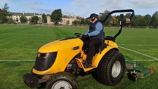 Football pitch grass cutting with small tractor in Saughton park Edinburgh [upl. by Farrell]