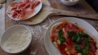 Preparing food in a Tulikivi bakeoven [upl. by Nueovas83]